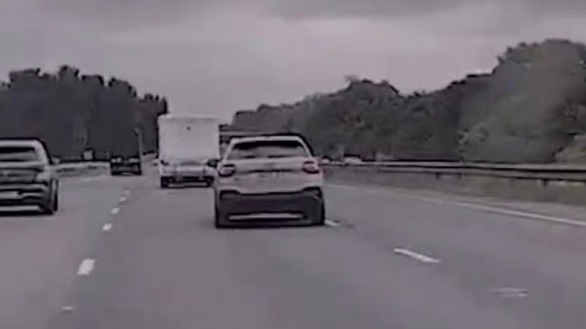 Moment Audi driver weaves through motorway traffic during 165mph police chase
