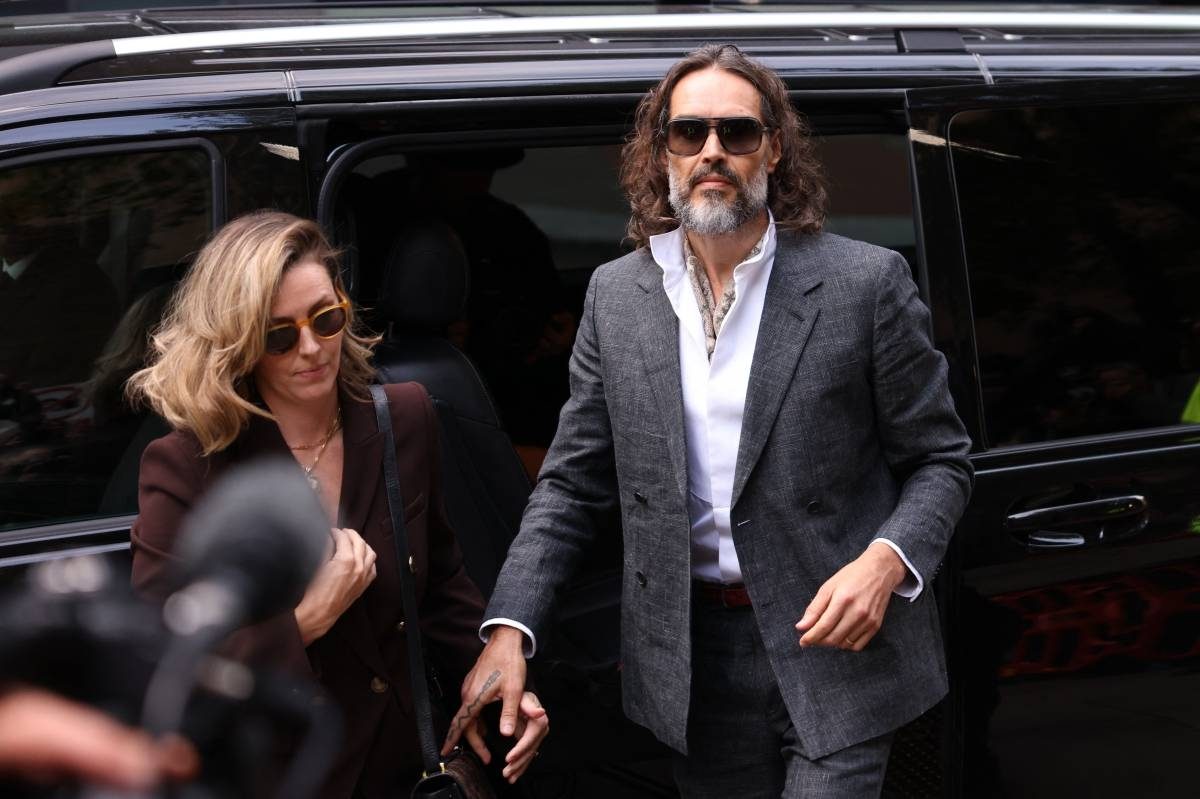 Comedian Russell Brand appears in UK court for start of rape trial
