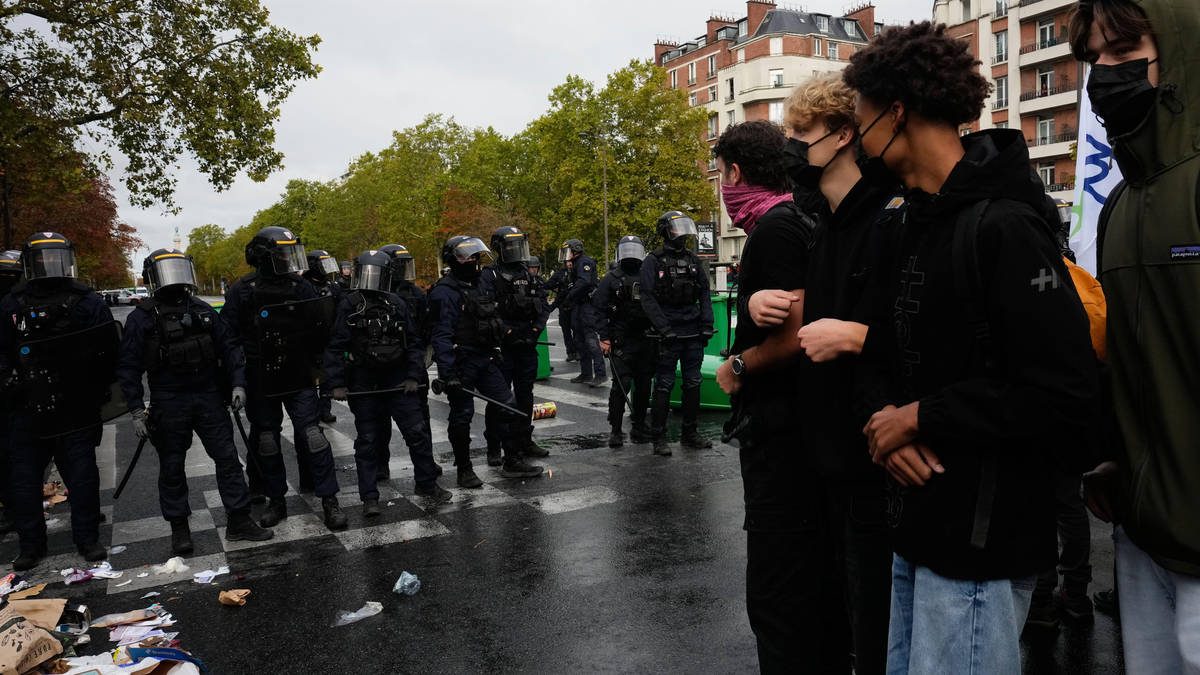 Tear gas and water cannons deployed as French police clash with students on new day of Paris school protests